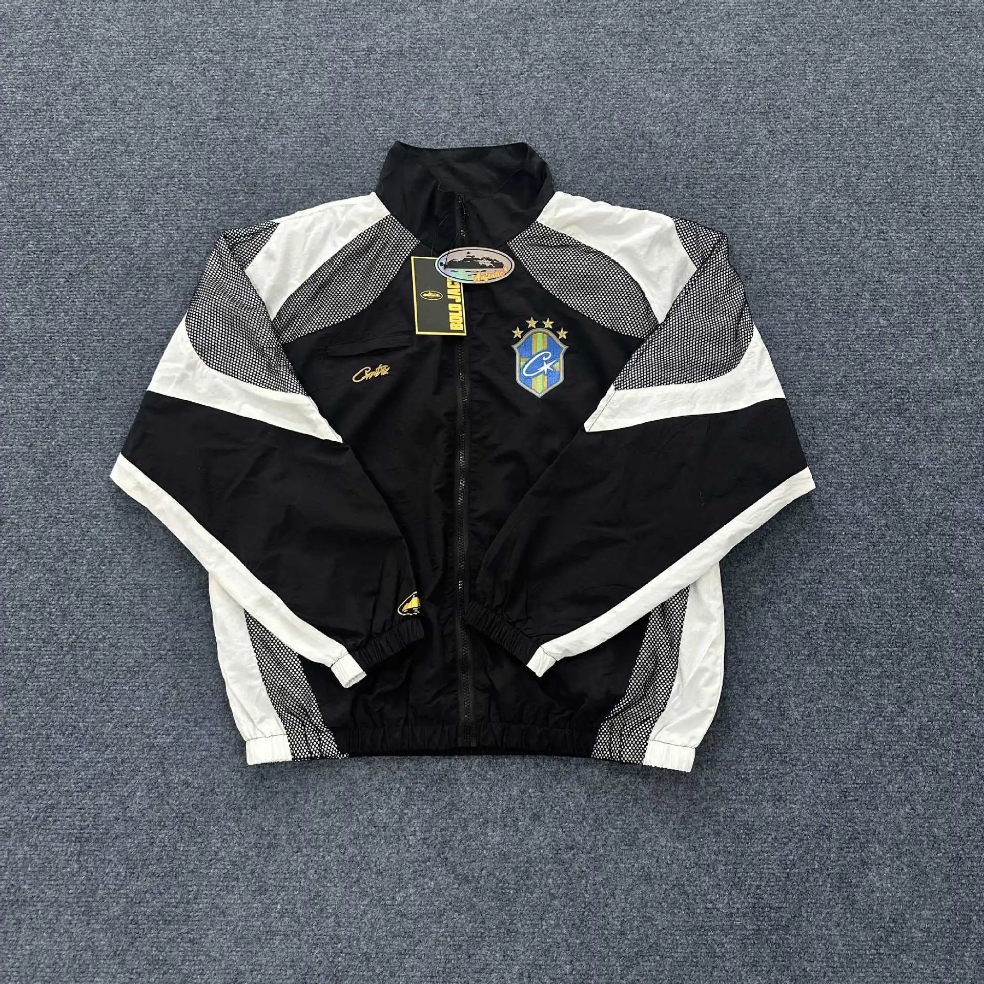 - Kakobuy CORTEIZ embroidered hip-hop jacket with small logo and letter L trench coat