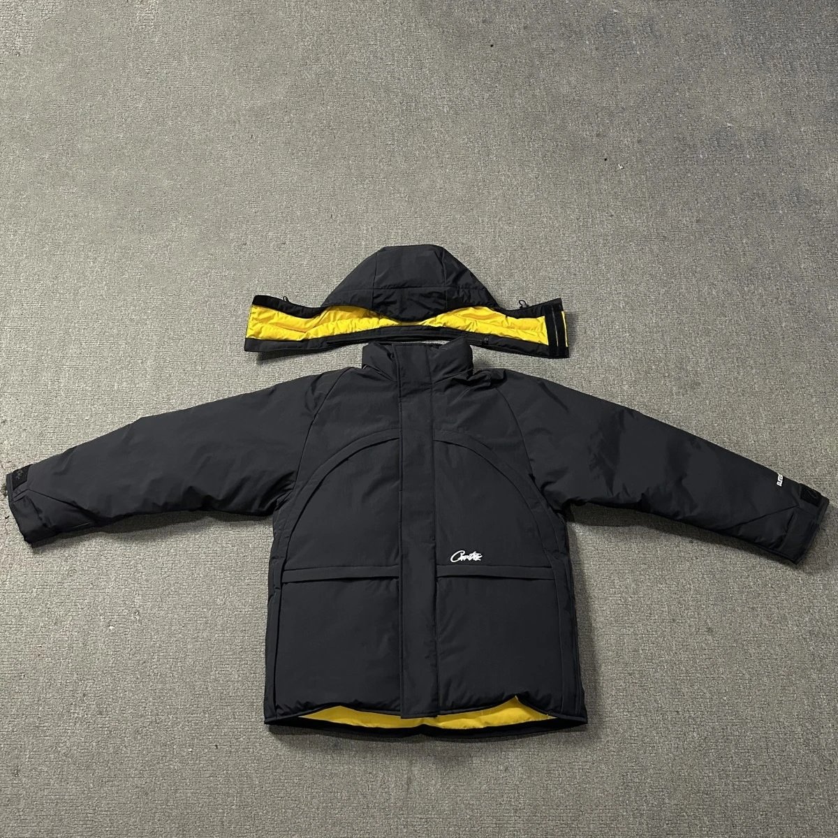 - Kakobuy Winter New Arrival Corteiz Printed Long Hooded Warm Down Jacket