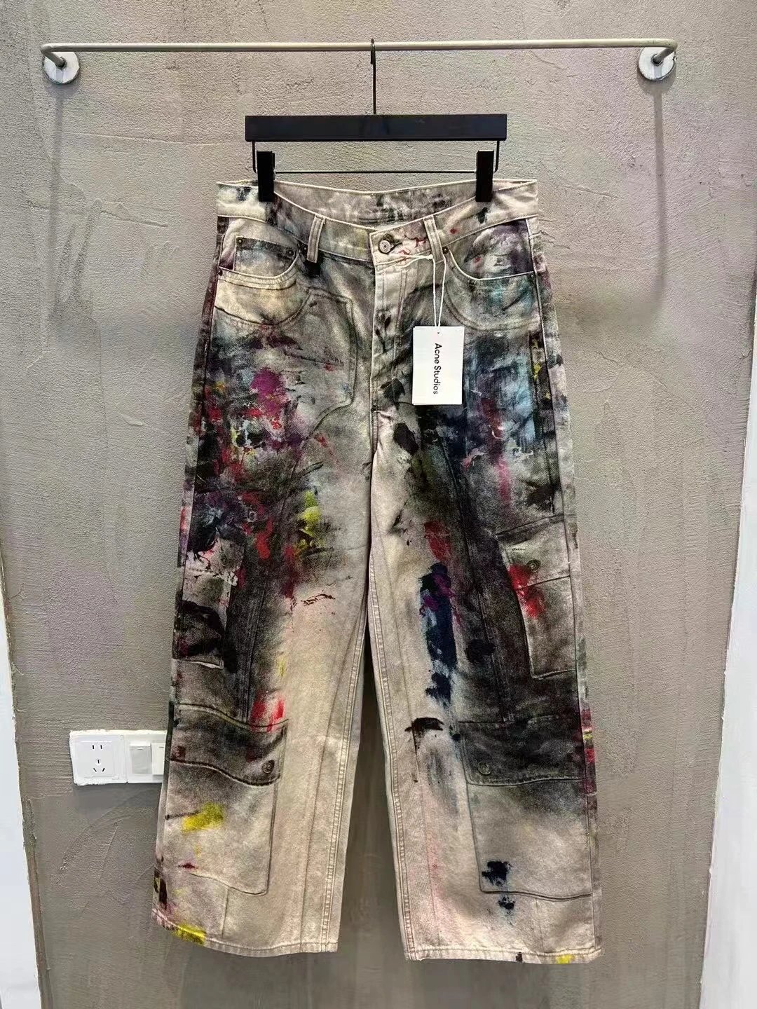 - Acne Studios FW25 New Ink-Splattered Distressed Paint Trousers