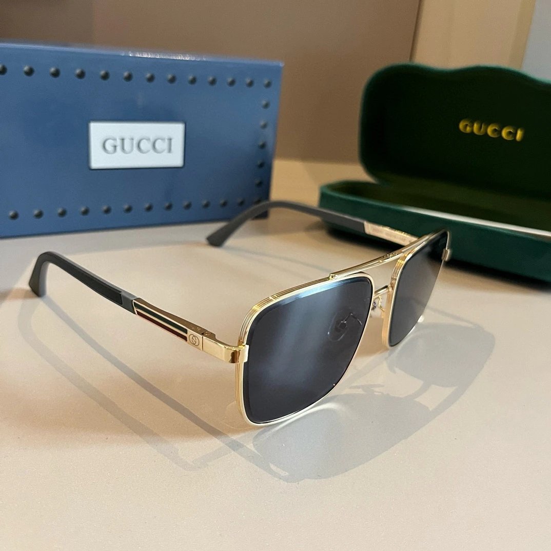 - Gucci Gold-rimmed Sunglasses