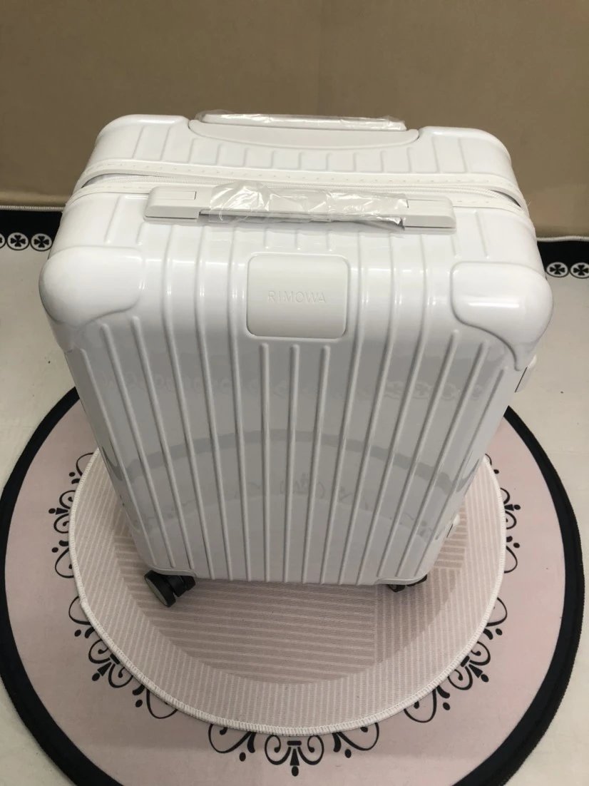 - Rimowa PC White Trolley Suitcase