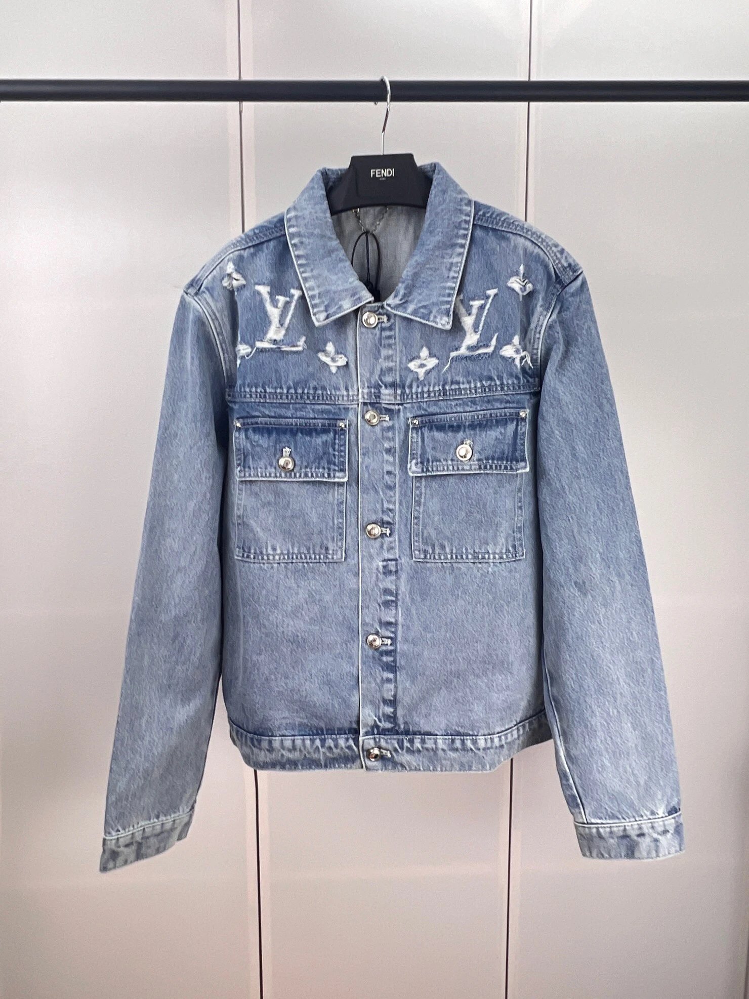 - Louis Vuitton Monogram Denim Jacket with Distressed Wash and Holes