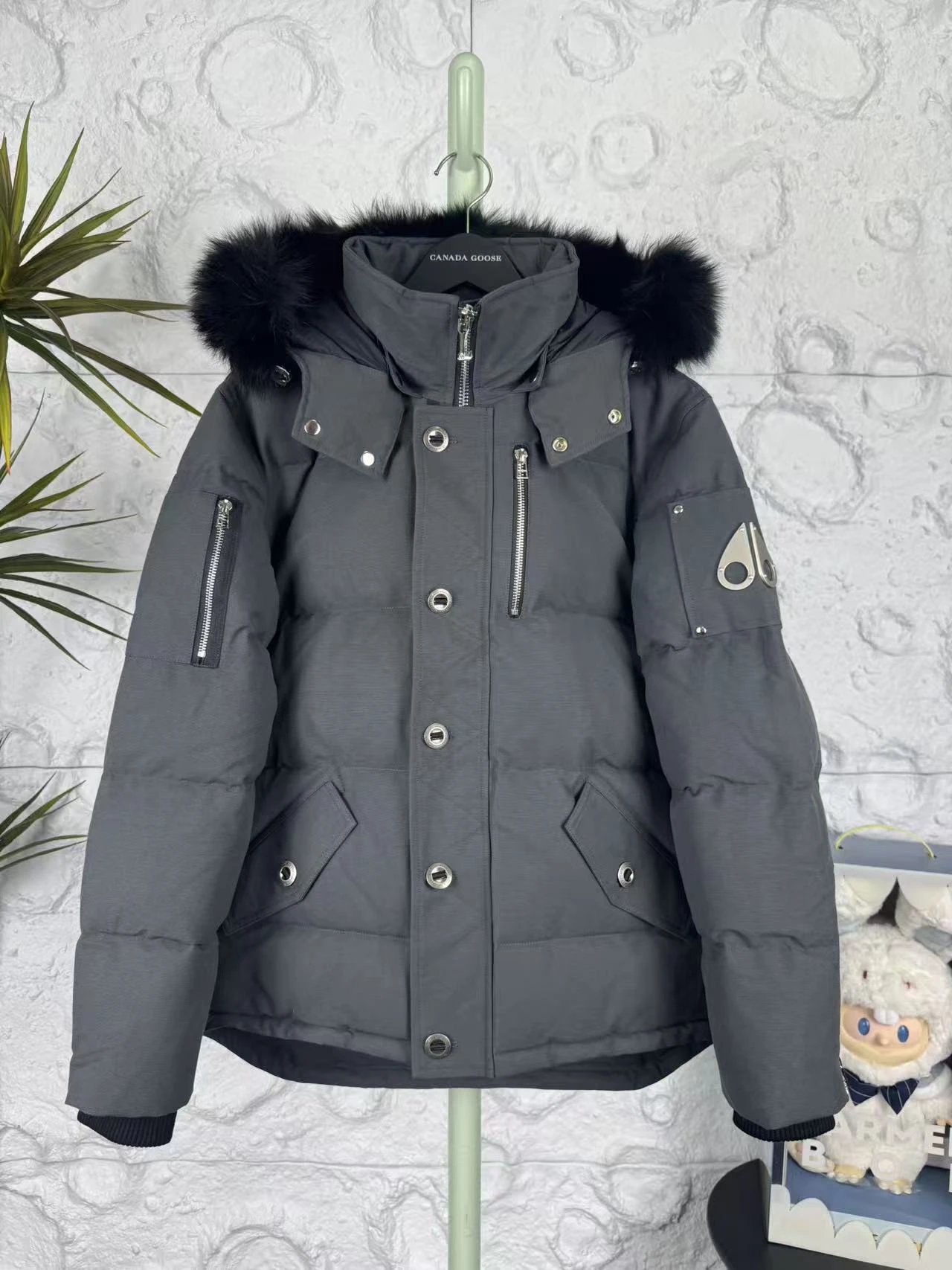 - Moose Knuckles Gray Fur-Trimmed Down Jacket